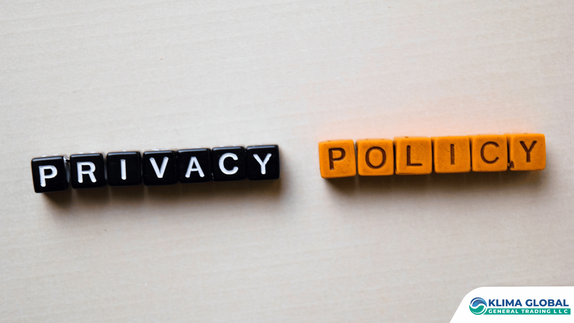 Privacy Policy spelled out using black and orange letter blocks on a beige background, with the Klima Global General Trading LLC logo in the bottom-right corner.