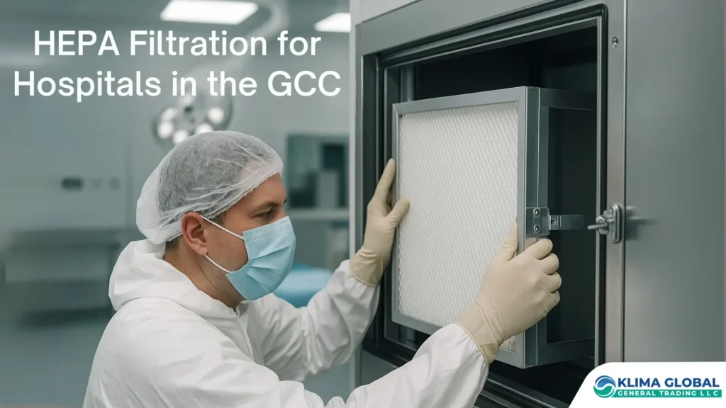 Technician wearing PPE installing a HEPA filter inside a hospital Air Handling Unit (AHU) with sterile surgical suite background – HEPA filters in hospitals of GCC.